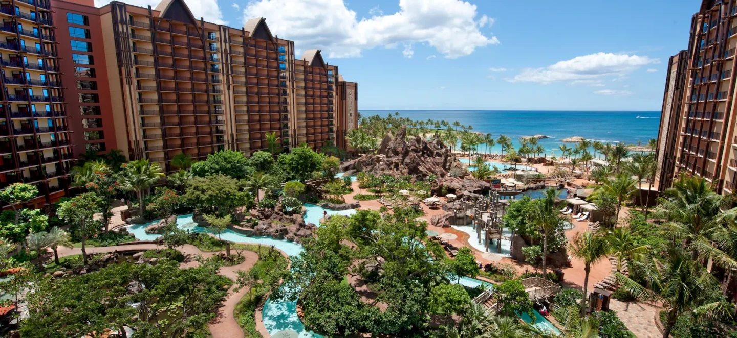 Aulani, A Disney Resort & Spa in Hawaii, featuring lush gardens, a lazy river, and a beautiful ocean view.